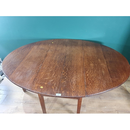 546 - An oak Gateleg Table with two fitted drawers, raised on square supports (Legs have been Tipped), 2ft... 