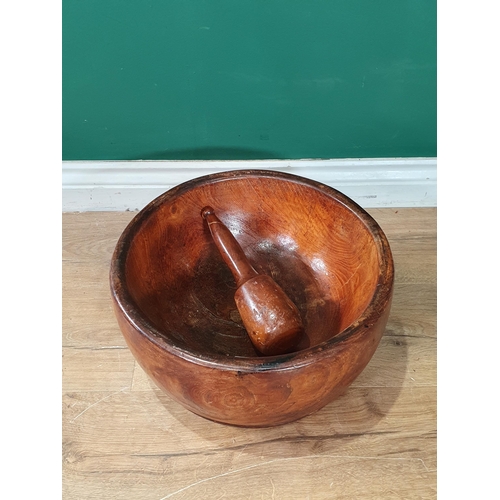 553 - A large treen Pestle and Mortar 1ft 2in D x 7in H (R7)