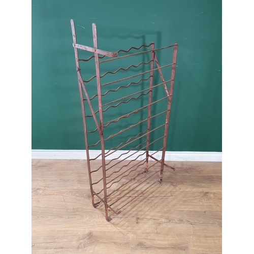 556 - A metal Wine Rack 4ft 2in H x 1ft 11in W (R7)