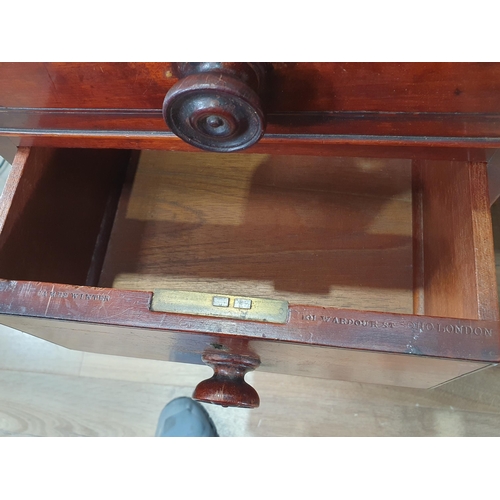 582 - A 19th Century mahogany Desk with red leather inset top fitted nine drawers on turned supports and c... 