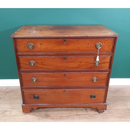 586 - A 19th Century mahogany Chest of four graduated drawers mounted on shaped brackets A/F 2ft 10in W x ... 