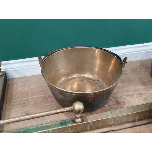 608 - Two brass Jam Pans, a copper two handled Pan, brass Meat Jack, two Copper Warming Pans, a brass Fend... 