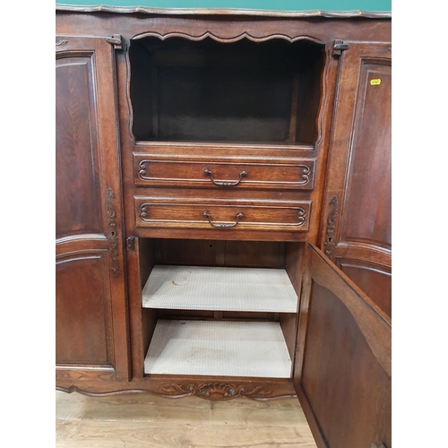 642 - A Continental oak Cupboard fitted three fielded doors and two drawers 4ft 8in W x 4ft 7in H (R9)