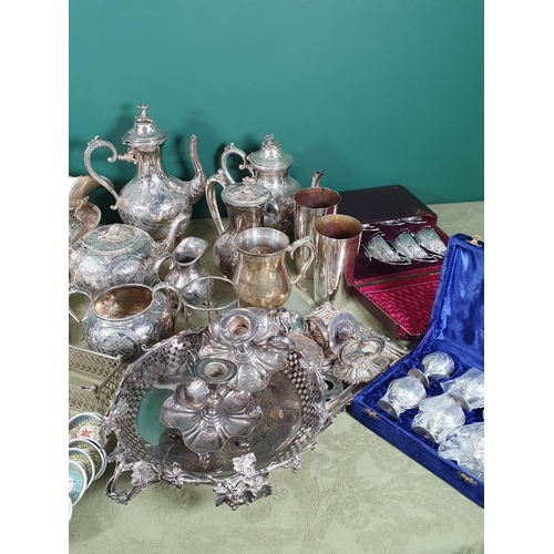 650 - A box of silver plated wares including Boat shaped Salts in case, Eggcups in case, four piece Tea an... 