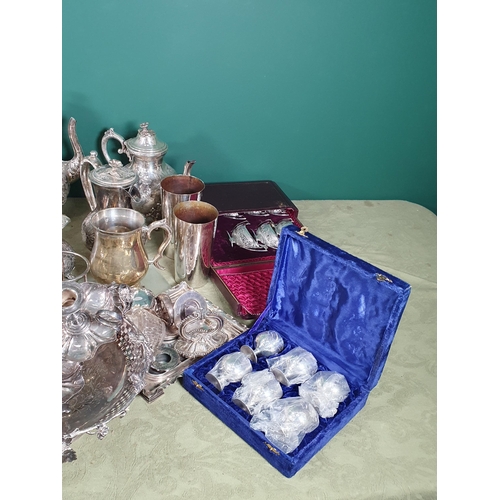 650 - A box of silver plated wares including Boat shaped Salts in case, Eggcups in case, four piece Tea an... 