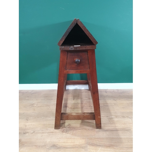 652 - An antique stained pine Saddle Horse folding out to a work table fitted drawer to each end 3ft 4in H... 