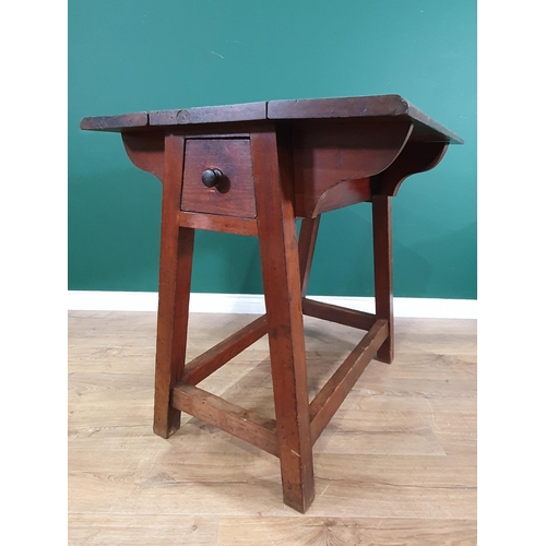 652 - An antique stained pine Saddle Horse folding out to a work table fitted drawer to each end 3ft 4in H... 