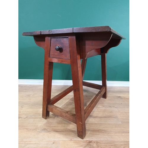 652 - An antique stained pine Saddle Horse folding out to a work table fitted drawer to each end 3ft 4in H... 