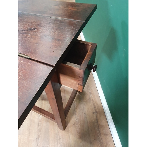 652 - An antique stained pine Saddle Horse folding out to a work table fitted drawer to each end 3ft 4in H... 