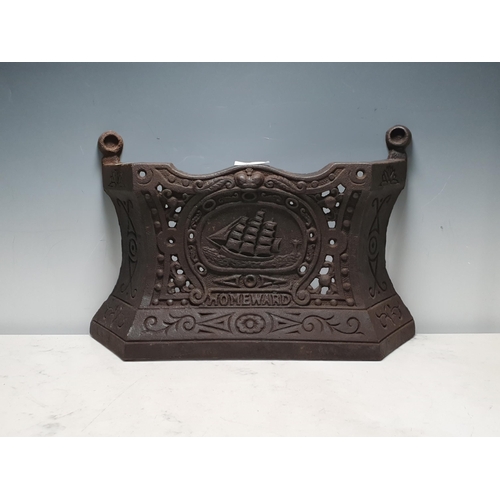 672 - A cast iron fire Front, 