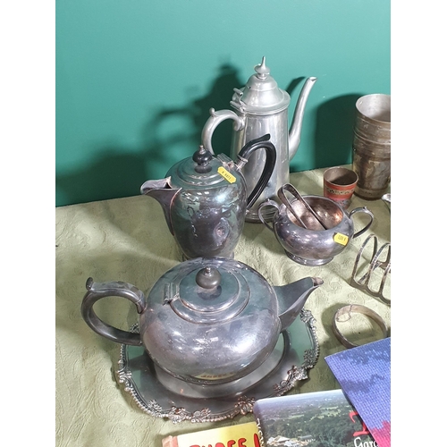 679 - *** WITHDRAWN ***  A quantity of plated items including a three piece Tea Set, Toastrack, an onyx Ci... 