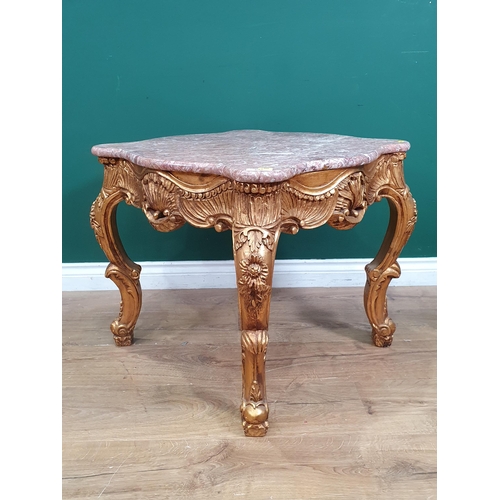 695 - A marble top Coffee Table with elaborate gilt base, 23 in square (R6)