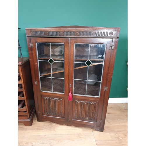 715 - A glazed Display Cabinet with linenfold panels, 4ft 3in H x 3ft W, an oak Wine Cabinet, 2ft 10in H, ... 