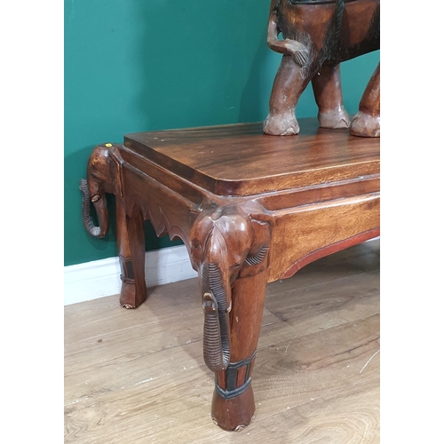 716 - A hardwood Coffee Table with elephant heads to the corners, 3ft 9in and an elephant Lamp Stand, 1ft ... 