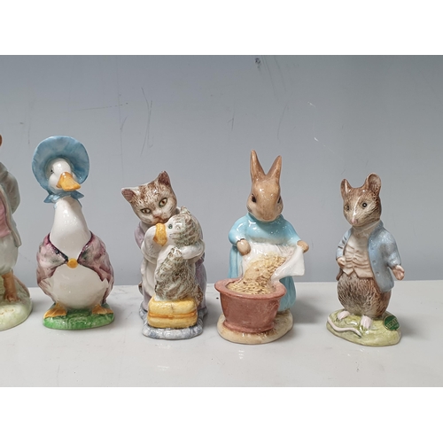 82 - Eight Beswick Beatrix Potter Figures including 'The Old Woman who lived in a Shoe', 'Hinca Munca', '... 