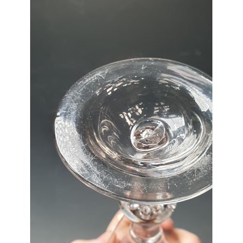 387 - An 18th Century Drinking Glass having trumpet bowl and air-twist stem, 7in H and another with trumpe... 