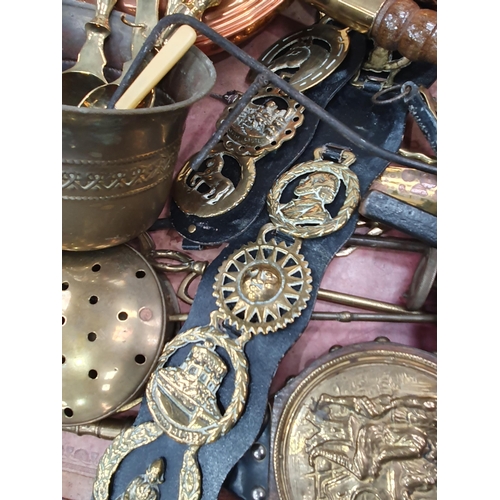 590 - A quantity of brassware including Warming Pan, Trays, Horse Brasses, etc. (R9)