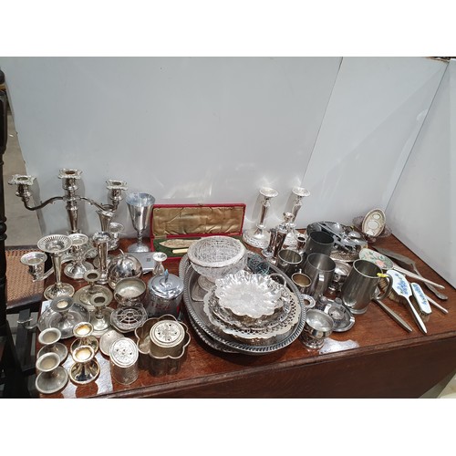 737 - A quantity of plated items including Trays, Candlesticks, Tankards, Dressing table items etc