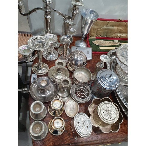 737 - A quantity of plated items including Trays, Candlesticks, Tankards, Dressing table items etc