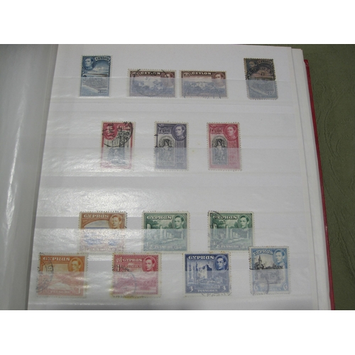 409A - An Album containing a selection of KGV1/QEII stamps, various Commonwealth countries together with a ... 