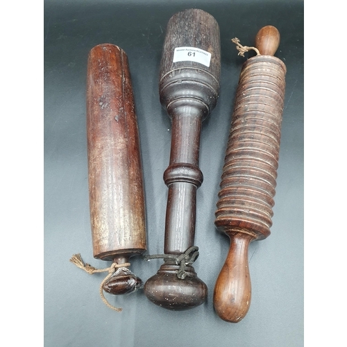 61 - Two treen Rolling Pins and a Pestle