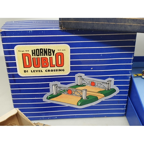 108 - A box of Hornby Dublo 3-rail Accessories including three Controllers, Track, Points, Buffers, Level ... 