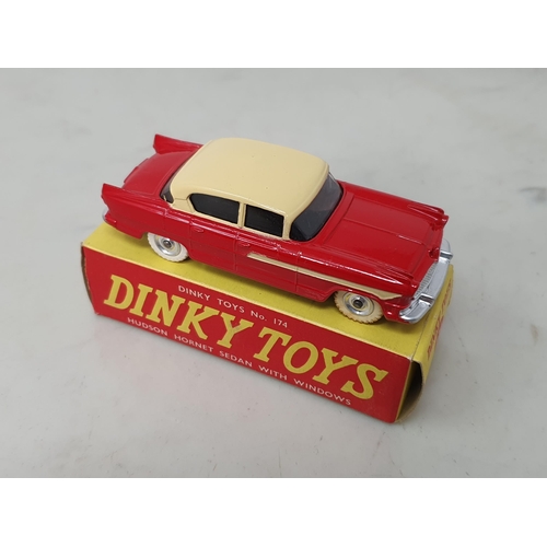 118 - Dinky Toys 174 red and cream Hudson Hornet Sedan, boxed