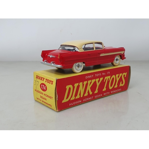 118 - Dinky Toys 174 red and cream Hudson Hornet Sedan, boxed