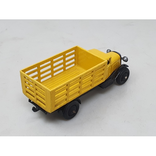 122 - Dinky Toys 30n yellow and black Produce Wagon, possible repaint