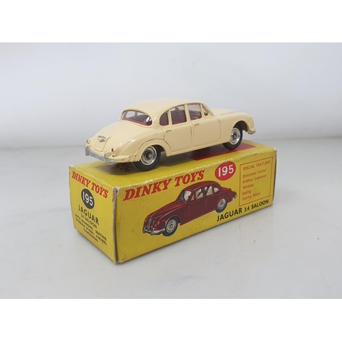 124 - A boxed Dinky Toys No.195 cream Jaguar 3.4L Saloon