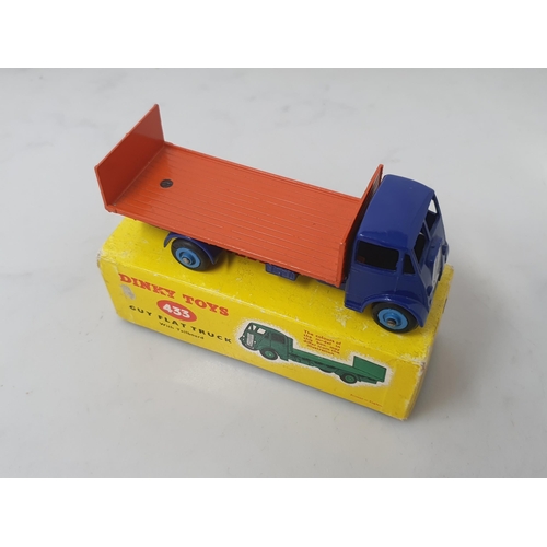 127 - A boxed Dinky Toys No.433 Guy Flat Truck with blue cab and orange back