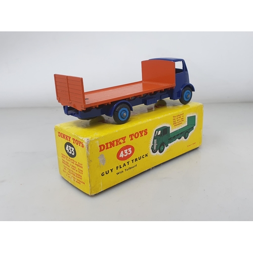 127 - A boxed Dinky Toys No.433 Guy Flat Truck with blue cab and orange back