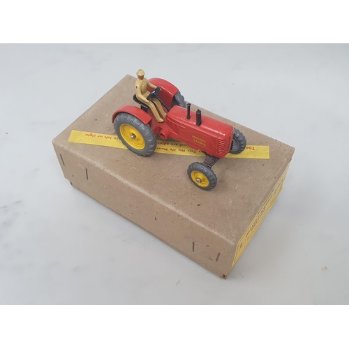 128 - A Dinky Toys No.3/27A Trade Box containing one Massey-Harris Tractor