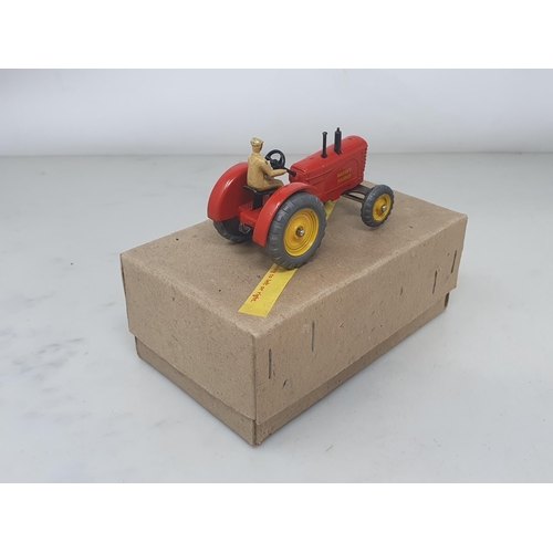 128 - A Dinky Toys No.3/27A Trade Box containing one Massey-Harris Tractor