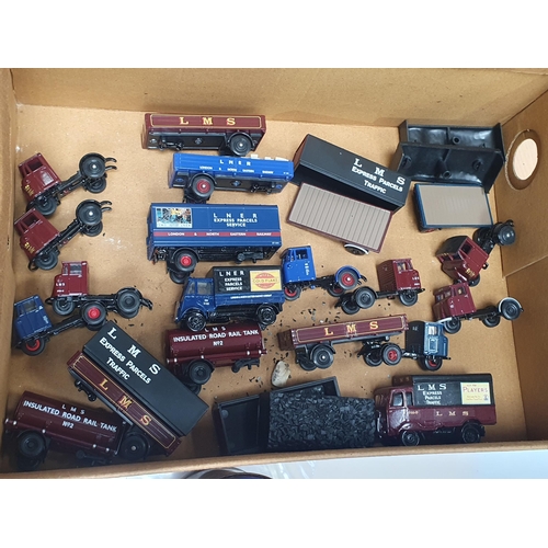 190 - A box of 00 gauge Railway accessories, track, lineside buildings, figures, etc. including unbuilt Me... 