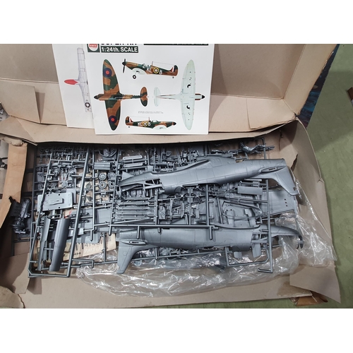 193 - An Airfix 1:24 scale Hurricane Mk1 Kit with contents in unsealed plastic bag, a Tamiya 1:48 scale Av... 