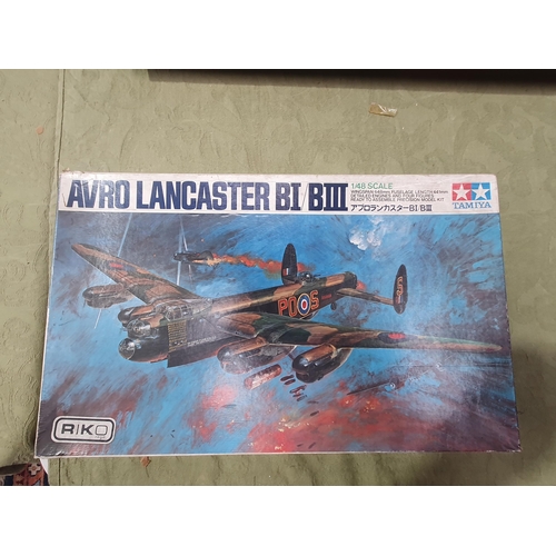 193 - An Airfix 1:24 scale Hurricane Mk1 Kit with contents in unsealed plastic bag, a Tamiya 1:48 scale Av... 