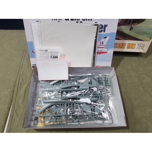 193 - An Airfix 1:24 scale Hurricane Mk1 Kit with contents in unsealed plastic bag, a Tamiya 1:48 scale Av... 