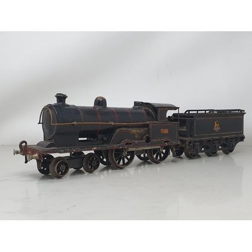 195 - A Bing for Bassett-Lowke 4-4-0 'George the Fifth' clockwork Locomotive and tender (considerable pain... 