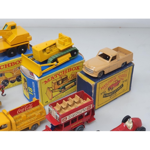 212 - Five play worn Lesney Matchbox Models in damaged boxes including No.50, No.60, No.13, No.52, a Model... 