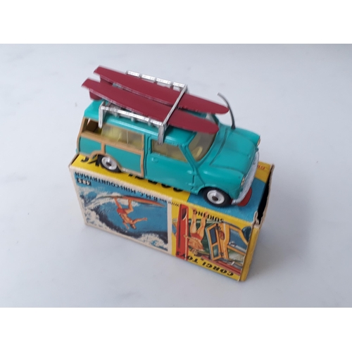 240 - A boxed Corgi Toys No.485 B.M.C. Mini Countryman Surfing with surf boards and figure