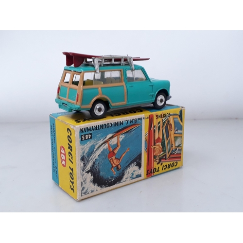 240 - A boxed Corgi Toys No.485 B.M.C. Mini Countryman Surfing with surf boards and figure