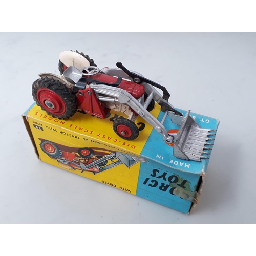 243 - A boxed Corgi Toys No.57 Massey-Ferguson 65 Tractor with fork