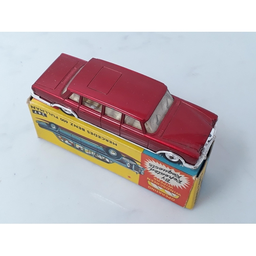 245 - A boxed Corgi Toys No.247 metallic red Mercedes-Benz 600 Pullman