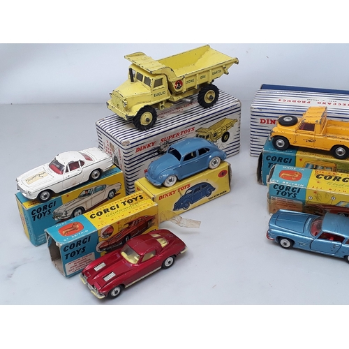 261 - Four Corgi Toys in play worn condition and damaged boxes including No.406S Land Rover, No.241 Ghia L... 