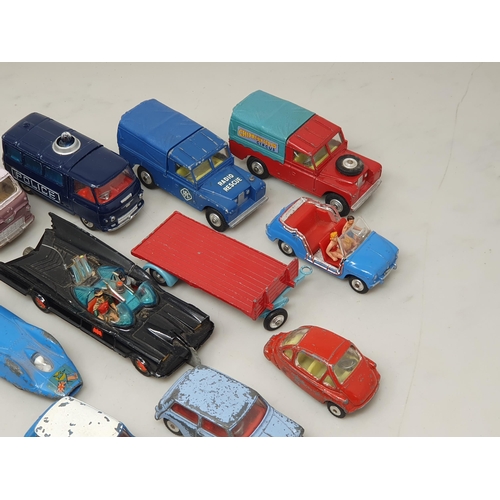 262 - Sixteen play worn Corgi and Dinky Toys including Mini Police Van, Ford Thames Caravan, Batmobile, Gh... 