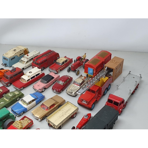 263 - A box of play worn Corgi and Dinky Toys including Massey-Harris Tractor, Hudson Hornet Sedan, Superi... 