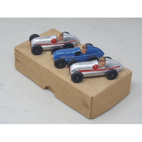 268 - A Dinky Toys Trade Box 23C containing three Racing Cars