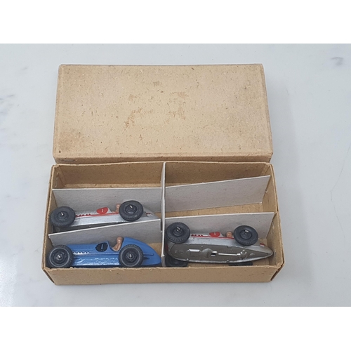 268 - A Dinky Toys Trade Box 23C containing three Racing Cars