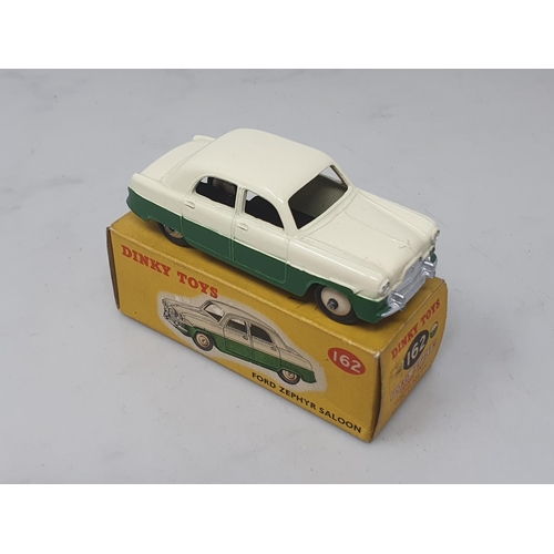 273 - A boxed Dinky Toys No.162 cream and green Ford Zephyr Saloon